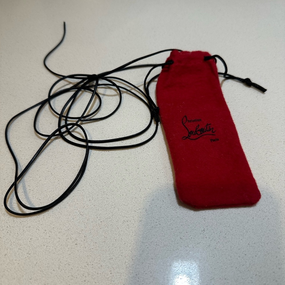 Christian Louboutin small Red Drawstring Bag and waxed shoelaces (laces are new)